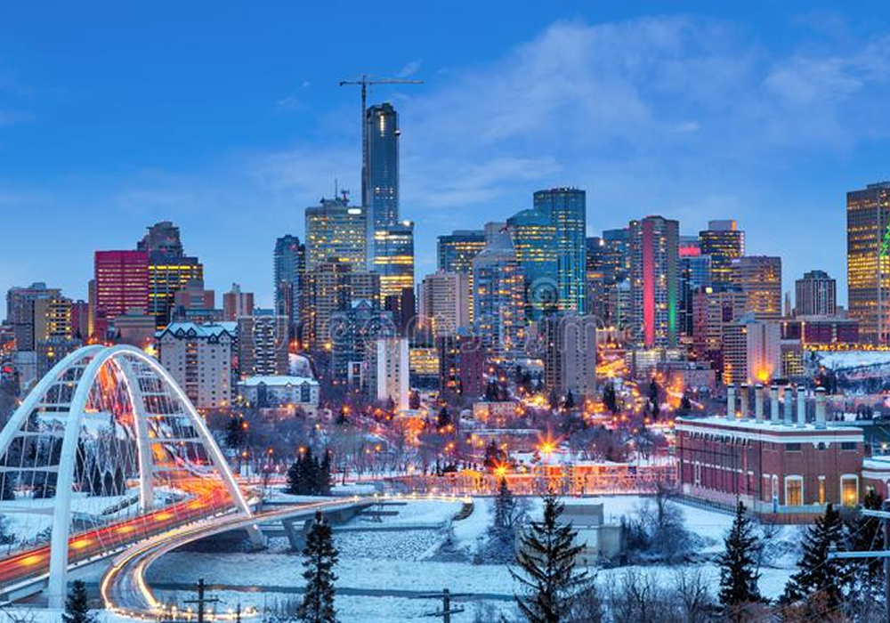 City skyline at dusk with snow
